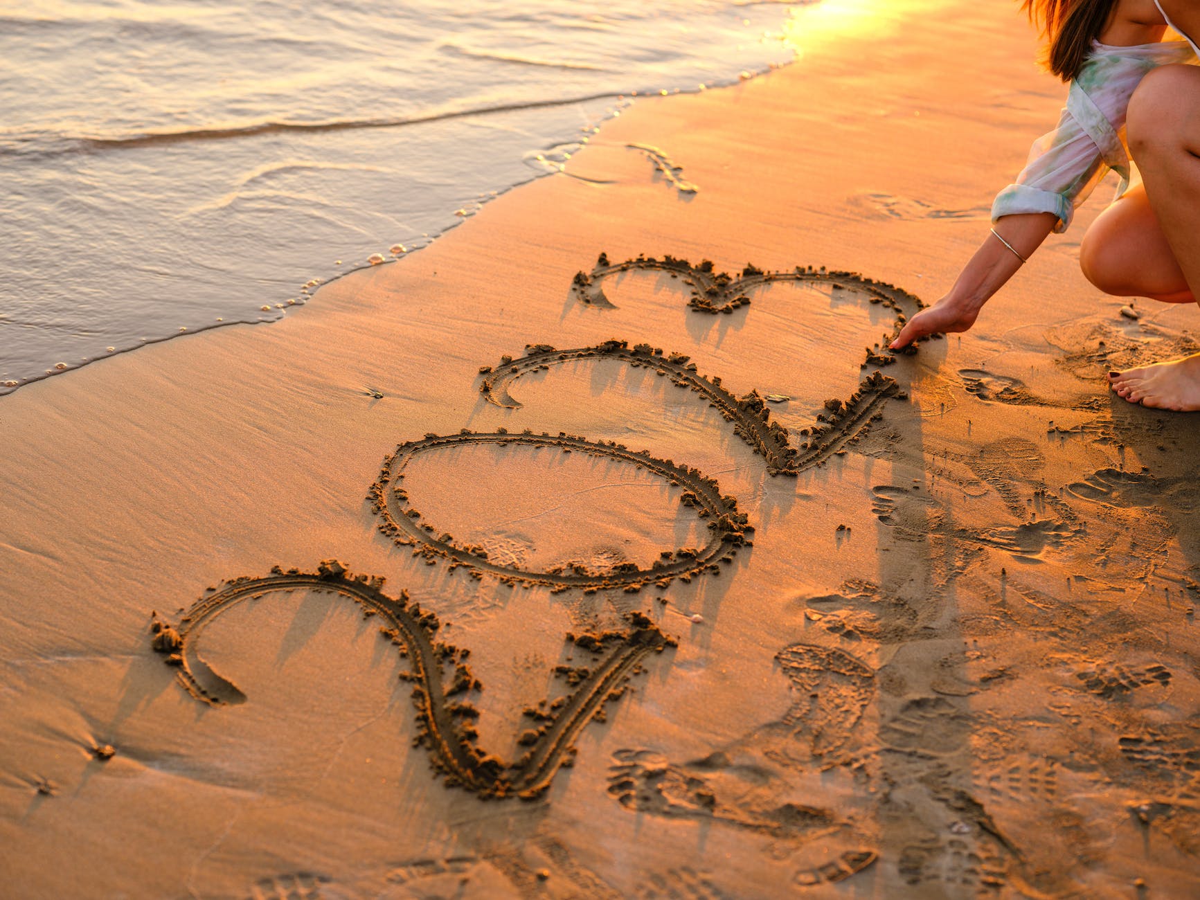 The numbers 2023 written in the sand.